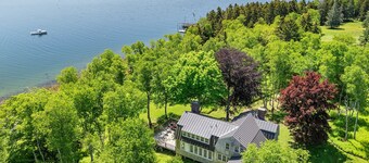 Oceanfront 5BR island retreat with deck, fireplace, and kayaks