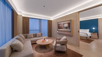 Luxury Suite, City View | Premium bedding, down comforters, memory foam beds, free minibar