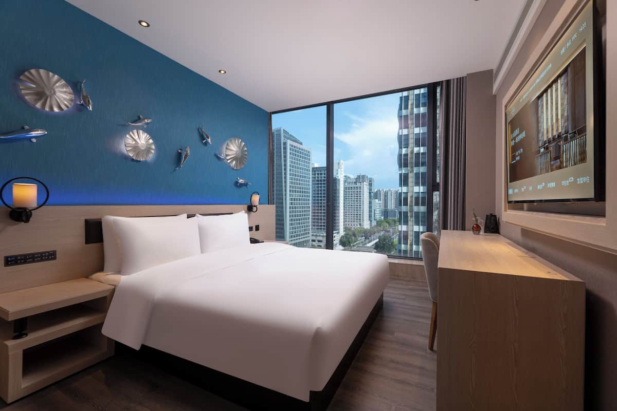 Basic Double Room, City View | Down duvets, free minibar, in-room safe, individually decorated