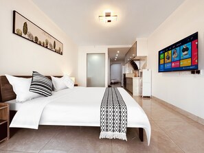 Habitación superior con 2 camas individuales, vista al océano | Wifi gratis 