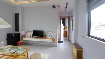 Junior Apartment, Balcony, City View | Living area | 25-inch Smart TV with digital channels, Netflix, streaming services