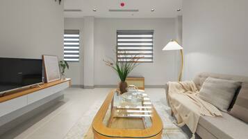 Junior Apartment, Balcony, City View | Living area | 25-inch Smart TV with digital channels, Netflix, streaming services