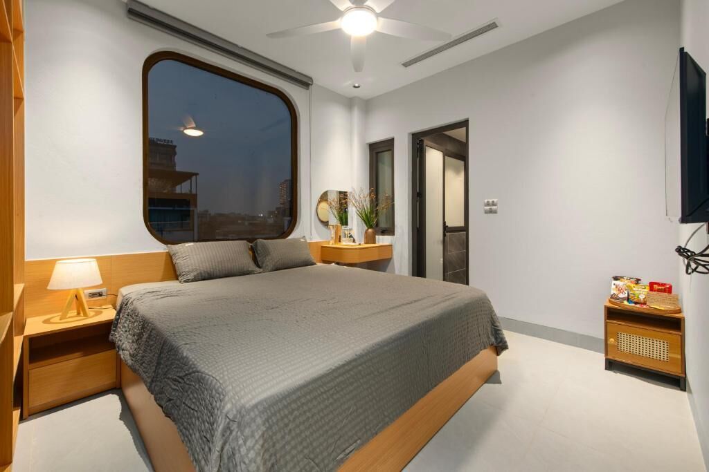 Desk, blackout curtains, soundproofing, iron/ironing board