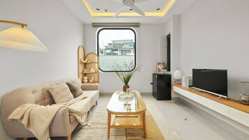 Junior Apartment, Balcony, City View | Living area | 25-inch Smart TV with digital channels, Netflix, streaming services