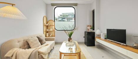 Junior Apartment, Balcony, City View | Living area | 25-inch Smart TV with digital channels, Netflix, streaming services