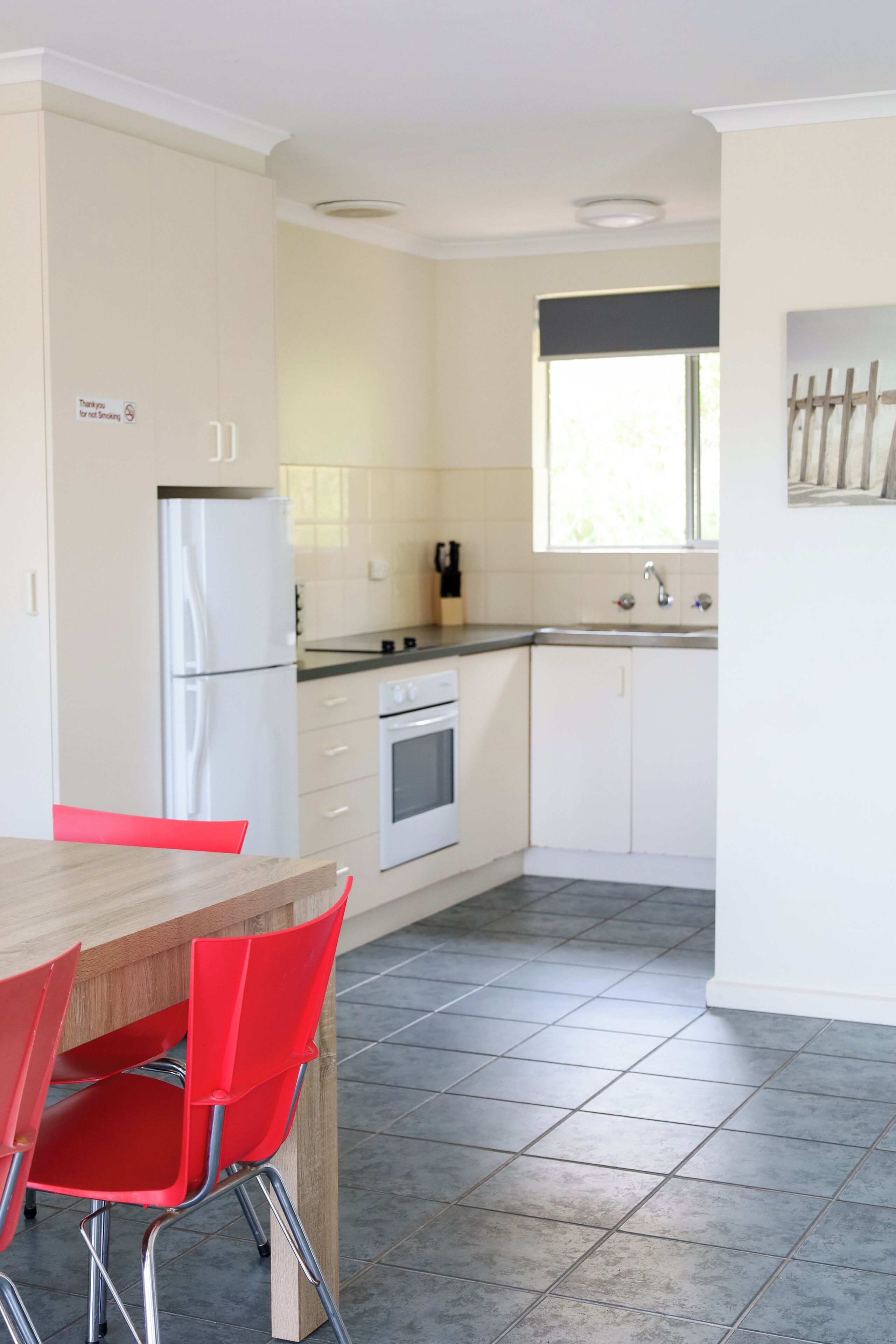 Mini-fridge, microwave, cookware/dishes/utensils