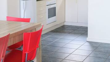 Mini-fridge, microwave, cookware/dishes/utensils