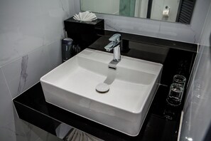 Family Room, City View | Bathroom | Shower, towels, soap, shampoo