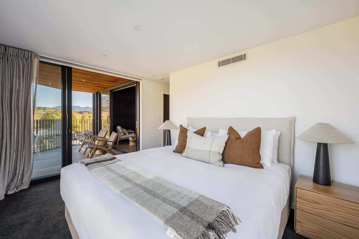 Clubhouse Apartments: 2 Bedroom, Corner Upper Level | Premium bedding, in-room safe, laptop workspace, blackout drapes