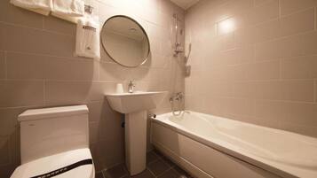 Hair dryer, towels, soap, shampoo