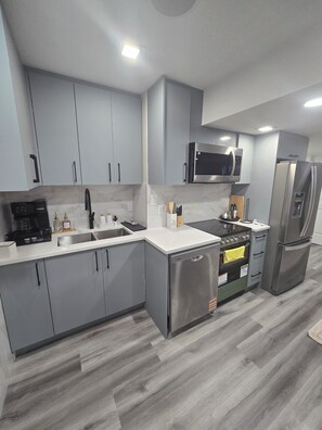 Fridge, microwave, oven, stovetop - Relax in this beautiful ,modern 2-bedroom basement suite in a quiet neighborhood (Edmonton)