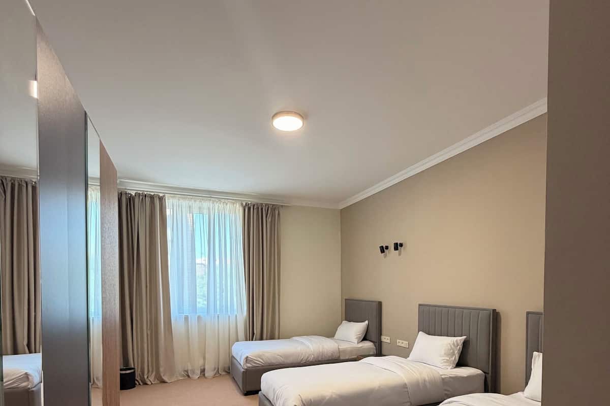 Chambre Triple Deluxe
