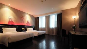 Deluxe Twin Room, Pets not allowed | In-room safe, desk, laptop workspace, blackout curtains