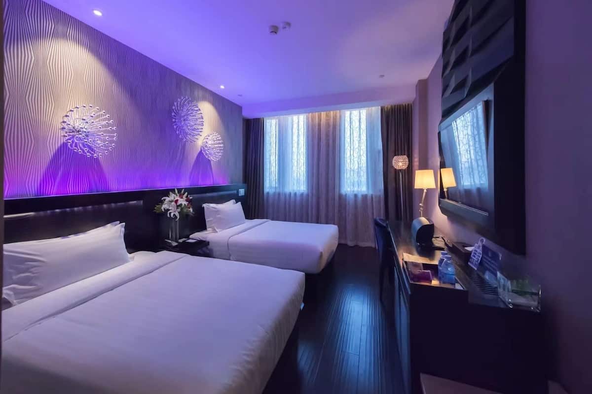 Premium bedding, down duvets, pillow-top beds, free minibar