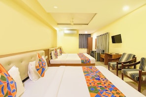 Family Room | Egyptian cotton sheets, premium bedding, in-room safe, desk - Fabhotel Nakshatra Grand (Hyderabad)