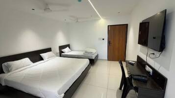 Egyptian cotton sheets, premium bedding, in-room safe, desk