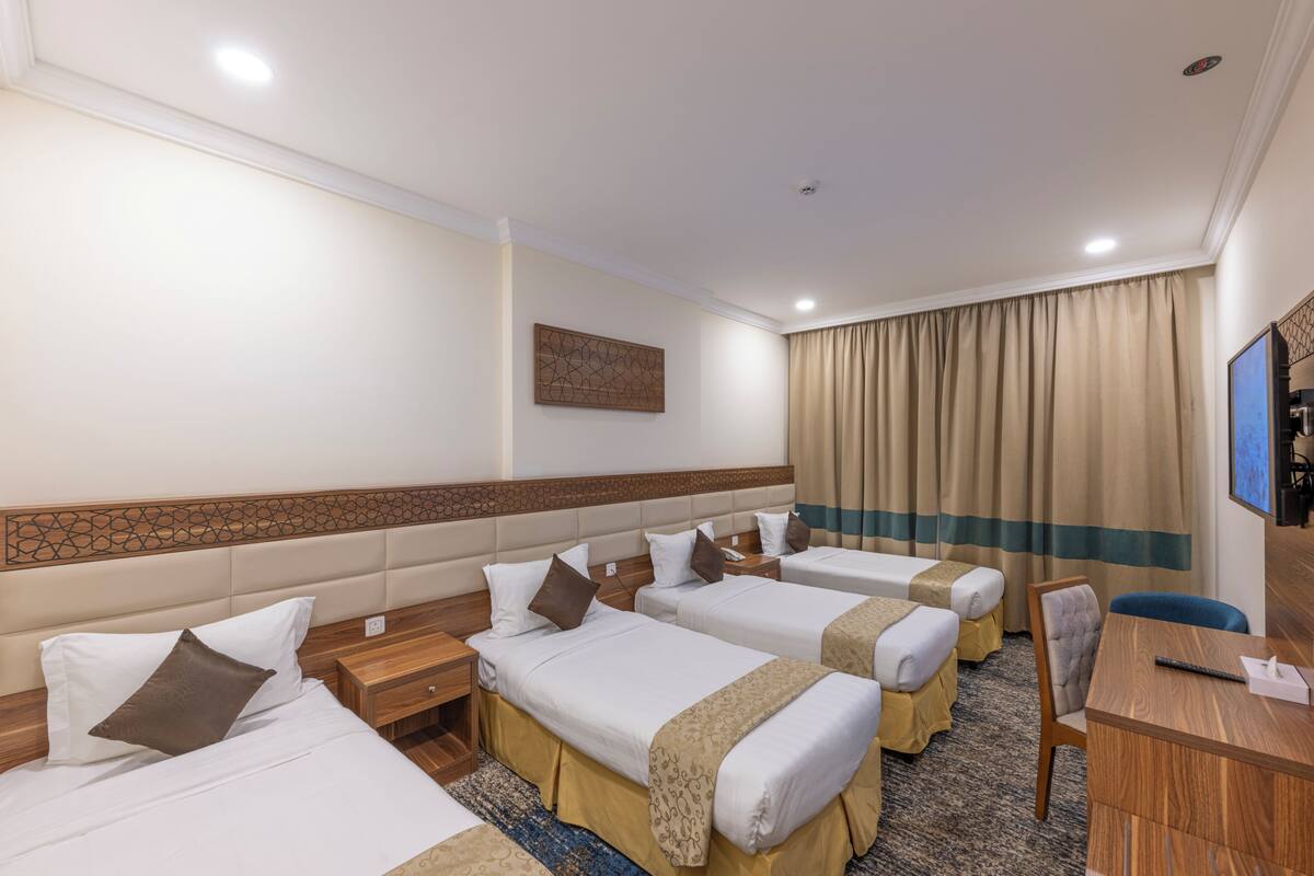 Quadruple Room | In-room safe, blackout drapes, iron/ironing board, free WiFi