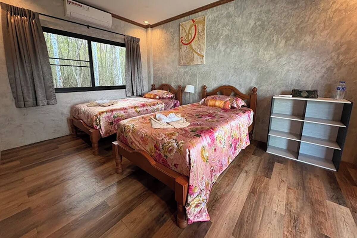 Chambre Deluxe avec lits jumeaux, vue baie | Bureau, fer et planche à repasser, Wi-Fi gratuit, draps fournis