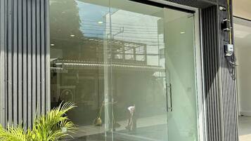 A storefront with a large glass window and a sign that reads 'Skyla Boutique.'