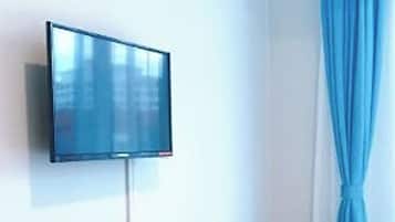Chambre avec lits jumeaux | Bureau, accès au Wi-Fi (inclus), literie fournie