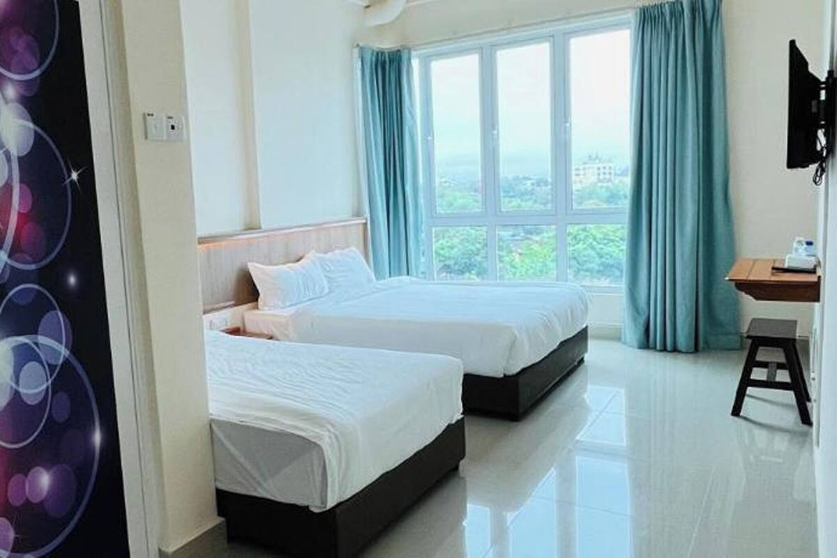 Habitación triple estándar | Escritorio, wifi gratis y ropa de cama 