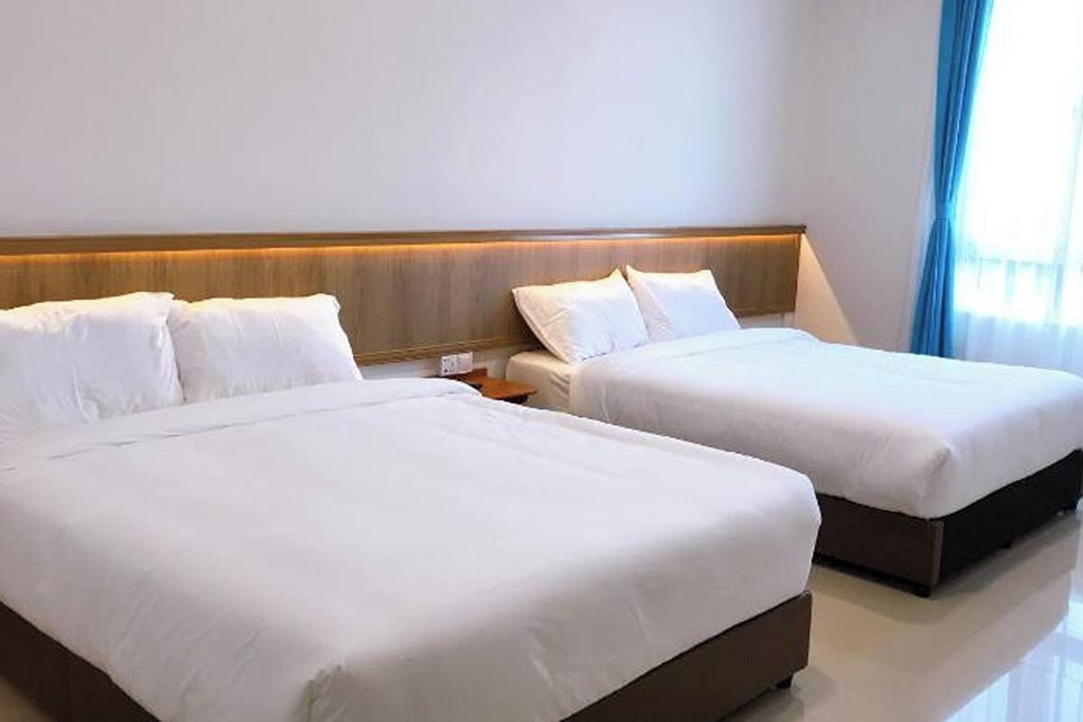 Habitación familiar | Escritorio, wifi gratis y ropa de cama 