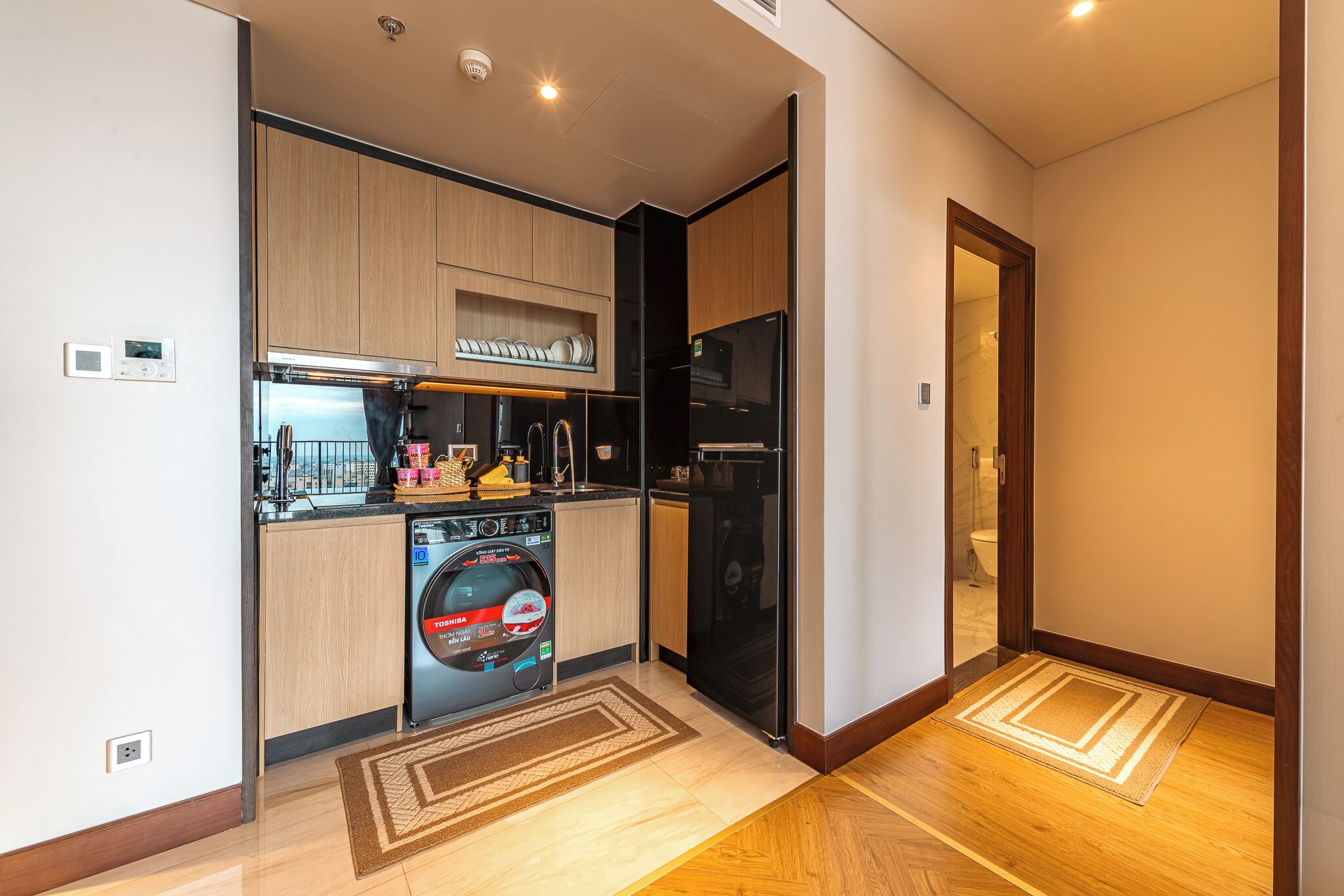 Appartement, vue partielle sur l'océan | Cuisine privée | Réfrigérateur grande capacité avec congélateur, surface de cuisson
