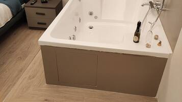 Shower, jetted tub, hair dryer, bidet