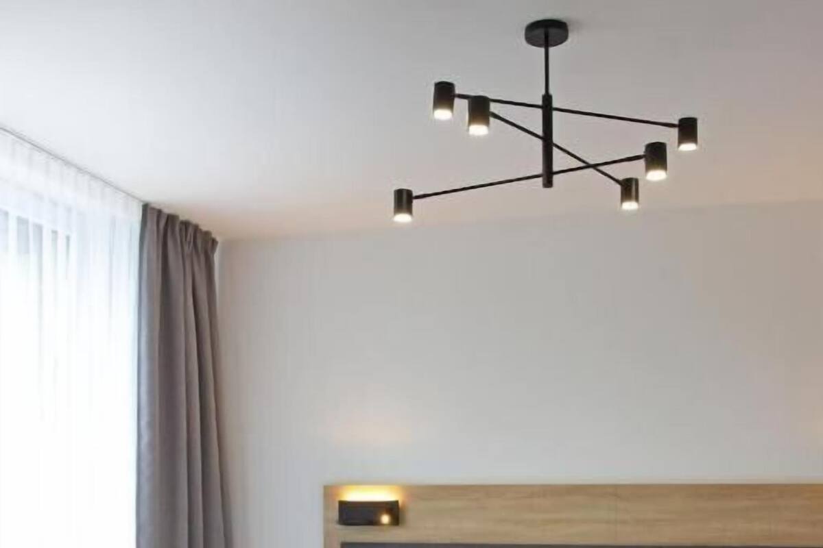 Habitación Deluxe con 1 cama doble o 2 individuales, vistas a la ciudad | Caja fuerte, sistema de insonorización, wifi gratis