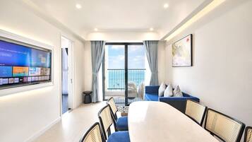 Family Penthouse | Living area | 52-inch Smart TV with cable channels, smart speakers