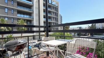 Apartamento | Restaurante al aire libre