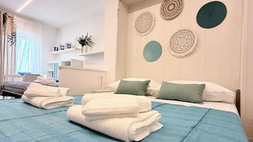 2 habitaciones, tabla de planchar con plancha, wifi y ropa de cama
