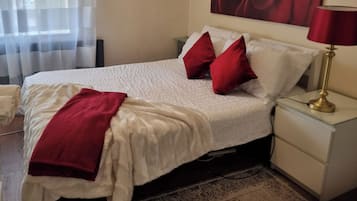 1 dormitorio, tabla de planchar con plancha, wifi gratis y ropa de cama