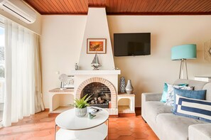 Fernseher, Kamin