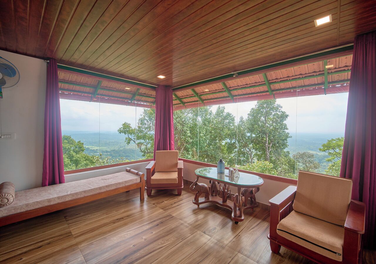 Suíte estúdio luxo, sacada, vista para o jardim | Área de estar