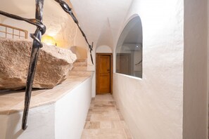 Interior - In the heart of Olbia, the gateway to the famous Costa Smeralda, behind the facade of a historic building dating back to 1905, lies a place, renovated and designed by the renowned architect Lesuisse.This luxurious loft, with direct access from the street (Olbia)