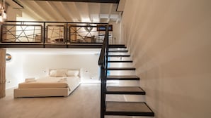 Unclassified image, 5 of 24, button - In the heart of Olbia, the gateway to the famous Costa Smeralda, behind the facade of a historic building dating back to 1905, lies a place, renovated and designed by the renowned architect Lesuisse.This luxurious loft, with direct access from the street (Olbia)