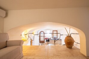 Interior - In the heart of Olbia, the gateway to the famous Costa Smeralda, behind the facade of a historic building dating back to 1905, lies a place, renovated and designed by the renowned architect Lesuisse.This luxurious loft, with direct access from the street (Olbia)