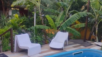 Family Room, Pool View | Terrace/patio