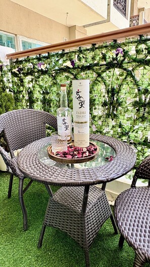 Outdoor dining - Casa Solaria by Artha Heritage with Cozy Balcony in Town Central, Greater Noida (Greater Noida)