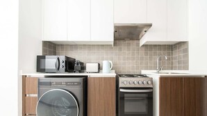 Coffee/tea maker, fridge, microwave, oven - Beachfront Studio W Pool & Gym Access (Ajmal Makan)