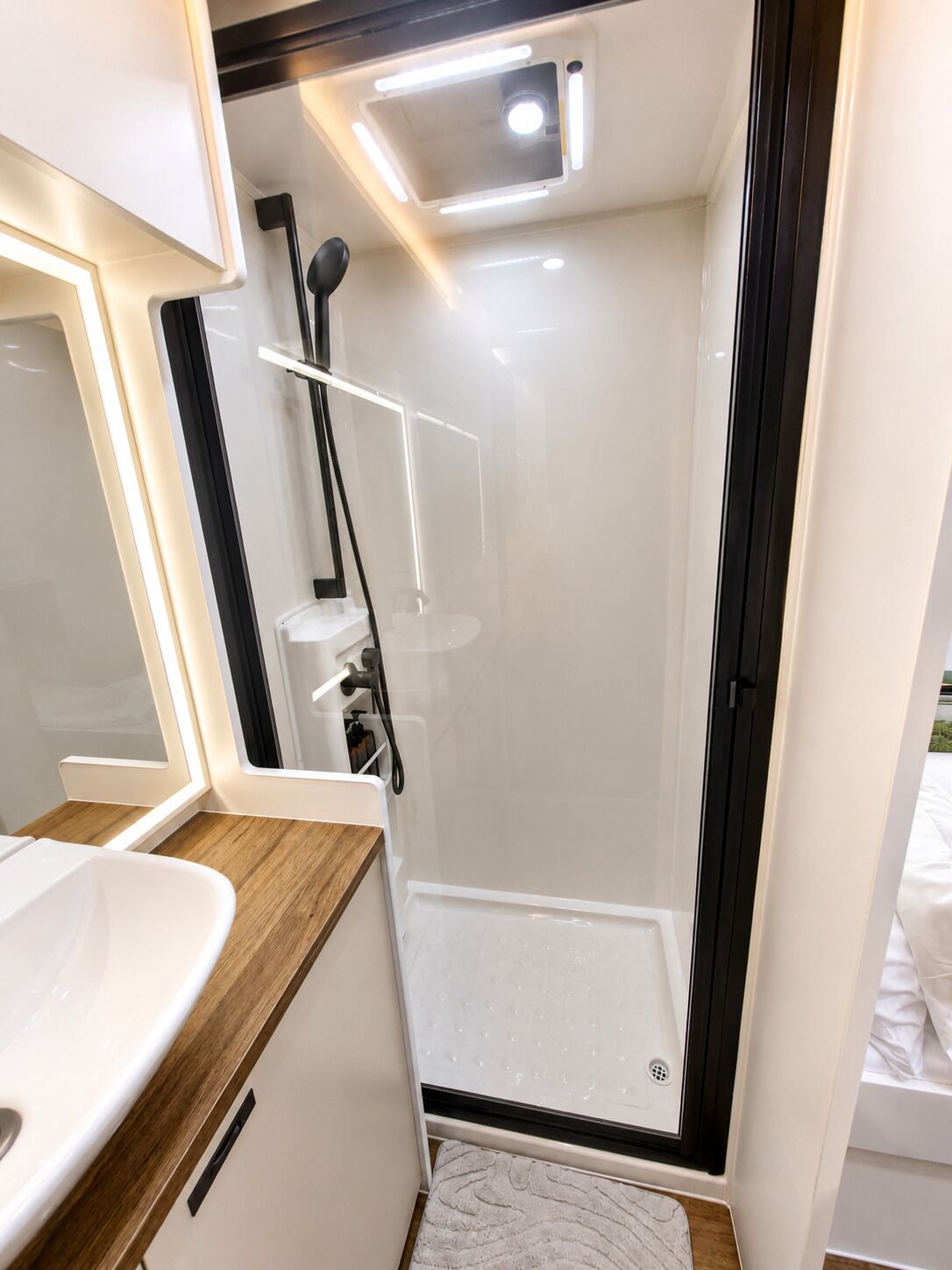 Shower, towels, soap, toilet paper