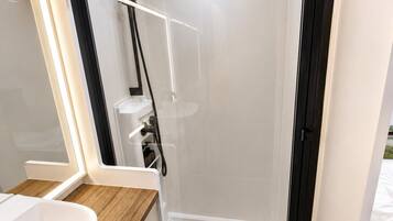 Shower, towels, soap, toilet paper