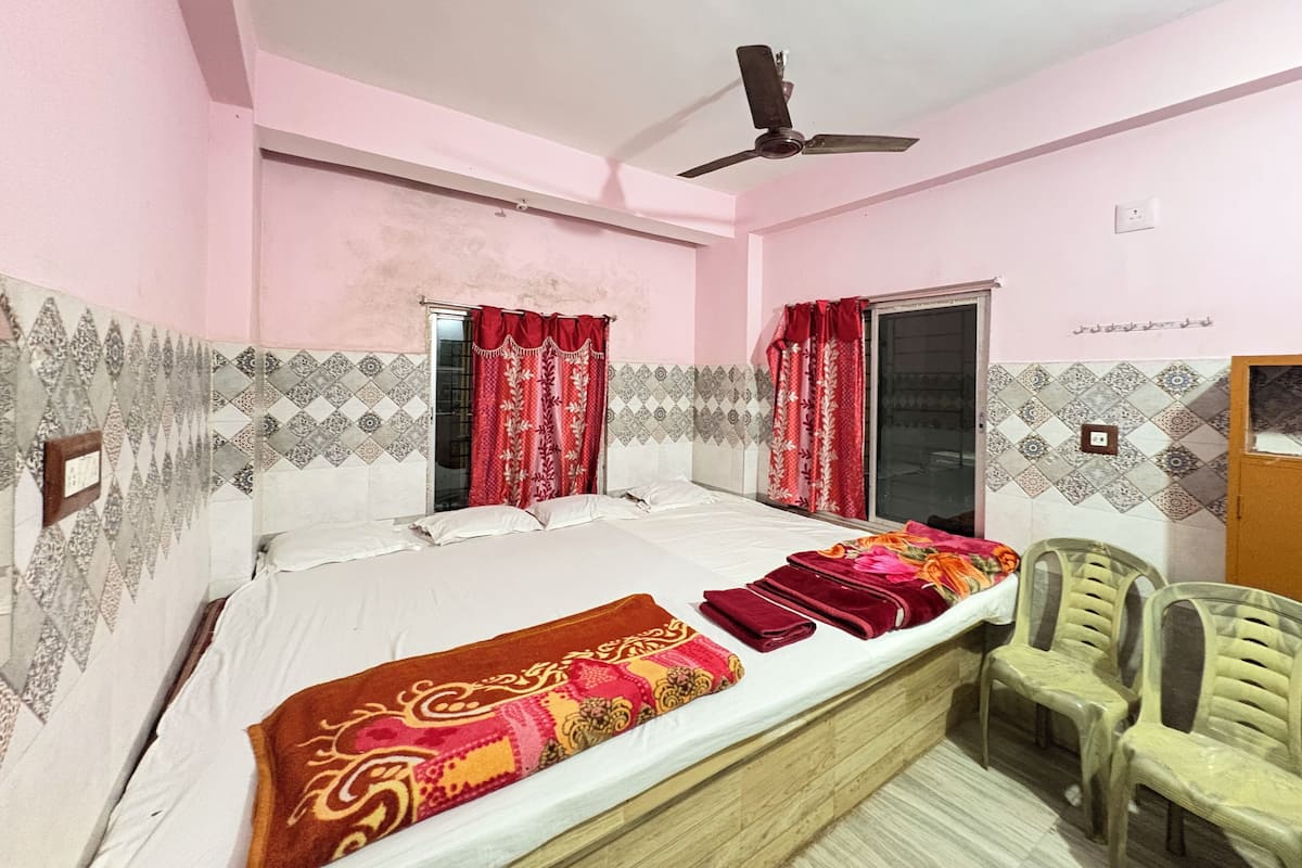 Standard Quadruple Room, City View | Desk, free WiFi