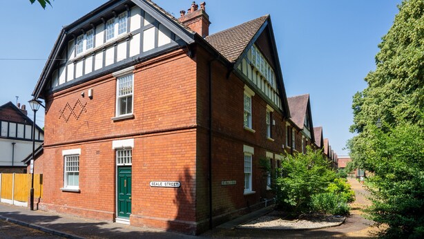 A red brick building with a green door, labeled 'SEALE STREET' and 'ST. PHILIPS ROAD.' - Finest Retreats | House on The Green (Derby)