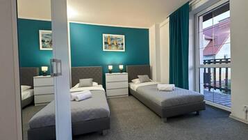 Desk, laptop workspace, WiFi (free), bed sheets