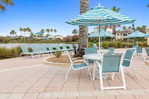 Outdoor dining - Newly remodeled top floor gem in Cinnamon Beach condo 1062!! (Palm Coast)