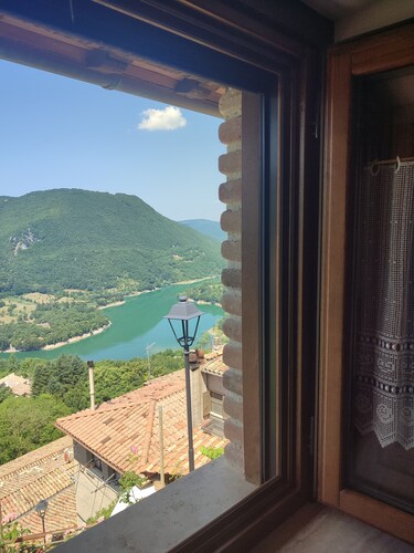 Stone farmhouse on Lake Turano