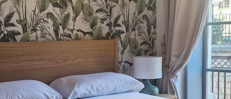 2 habitaciones, tabla de planchar con plancha, wifi y ropa de cama
