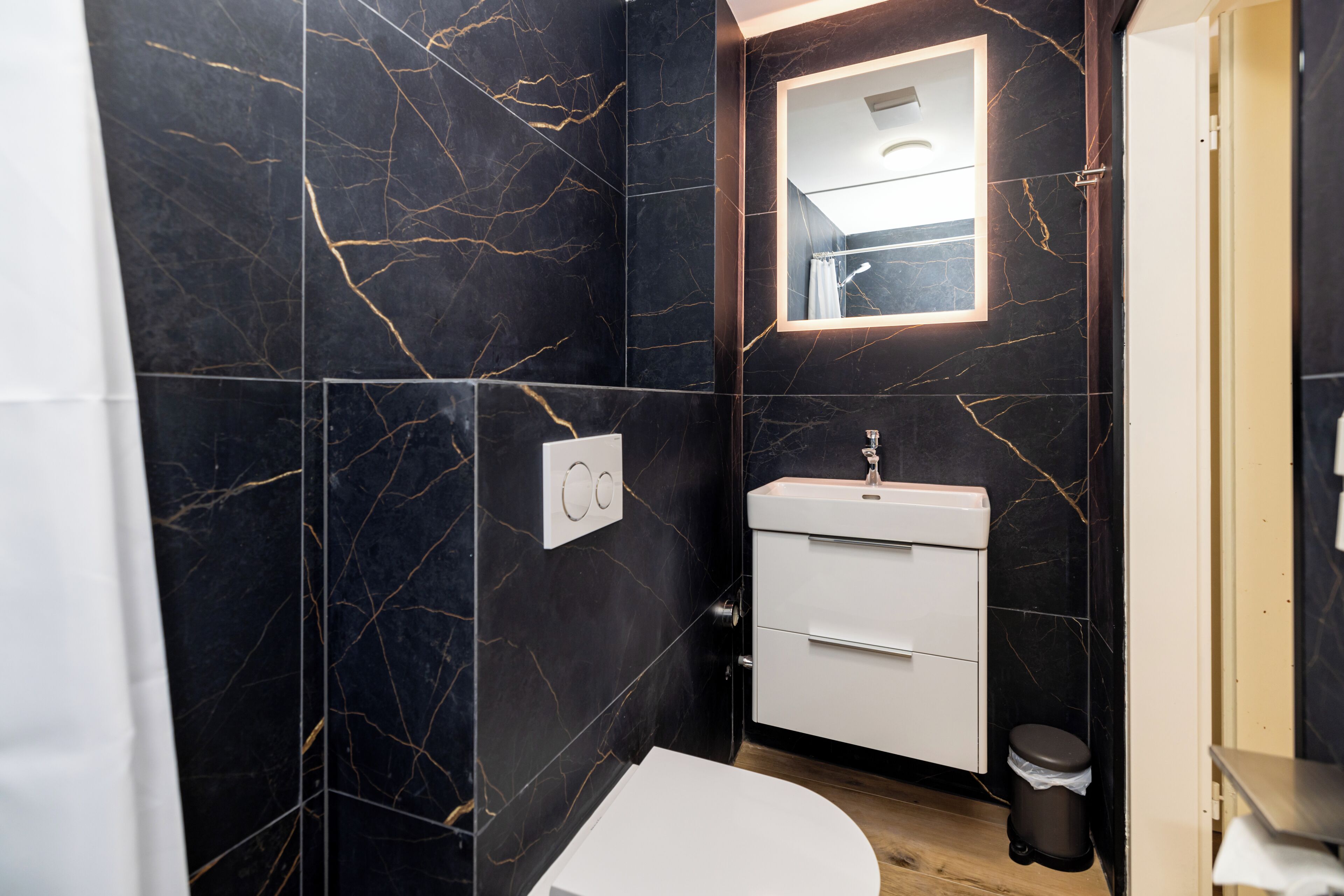 Shower, towels, soap, toilet paper